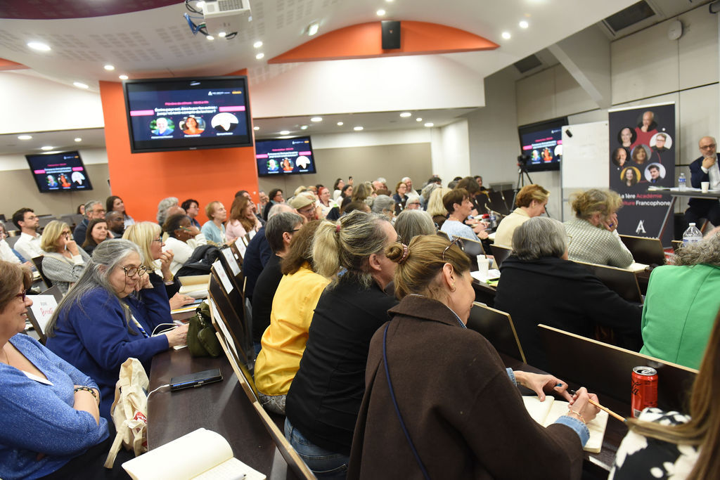 Public du Congrès des Passionnés de l'Écriture 2026, salle pleine pendant une plénière
